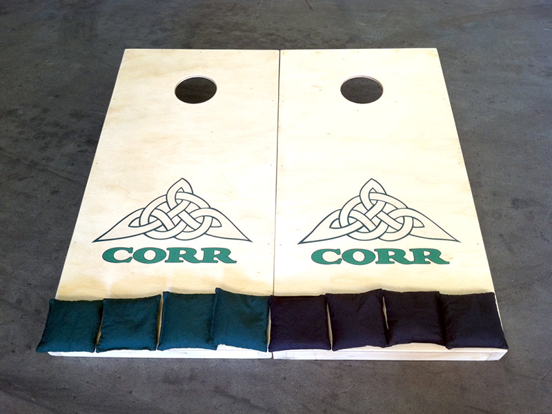 Cornhole game boards with custom corporate logo & custom bag colors – by IWI Wood Products