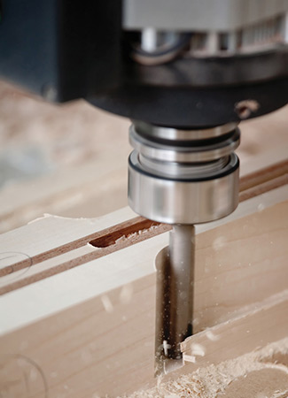 International Wood Industries, Inc. uses CNC machine to custom-mill lumber